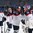 BUFFALO, NEW YORK - DECEMBER 28: Slovakia's Roman Durny #30 is congratulated by Samuel Bucek #13 and his teammates on being named player of the game following Slovakia's upset victory over USA during the preliminary round of the 2018 IIHF World Junior Championship. (Photo by Andrea Cardin/HHOF-IIHF Images)

